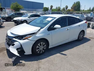 2021 Toyota Prius LE z VIN JTDKAMFP3M3187644, wystawiony jako IAAI lot #42443171 z przebiegiem 126 977 mil mil oraz . Historia ofert i sprzedaży dostępna na DreamBid. Obrazek 16.