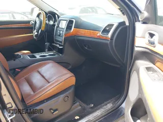 2013 Jeep Grand Cherokee Overland with VIN 1C4RJECT8DC534021, listed as a IAAI auction lot 42058374 with 137,289 mi miles. Bid and sale history available at carsss.com. Image 5.
