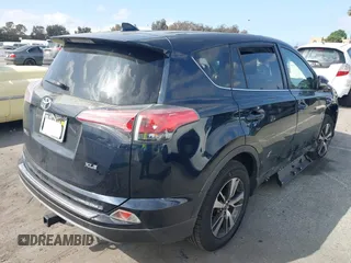 2017 Toyota RAV4 XLE with VIN JTMWFREV3HD105878, listed as a IAAI auction lot 41889338 with 75,784 mi miles. Bid and sale history available at carsss.com. Image 4.