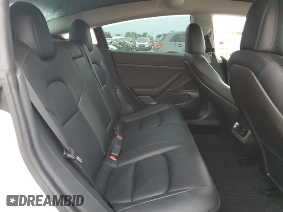 2020 Tesla Model 3 Standard Range Plus z VIN 5YJ3E1EA9LF661702, wystawiony jako Copart lot #55533725 z przebiegiem 66 286 mil mil oraz Szkoda całkowita • Salvage title. Historia ofert i sprzedaży dostępna na DreamBid. Obrazek 10.