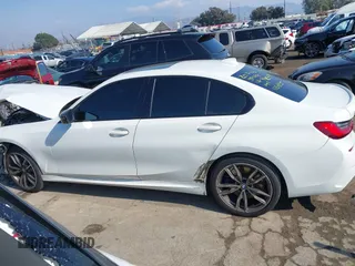 2020 BMW 3 Series M340i with VIN 3MW5U7J03L8B43176, listed as a IAAI auction lot 41450902 with 61,118 mi miles. Bid and sale history available at carsss.com. Image 14.