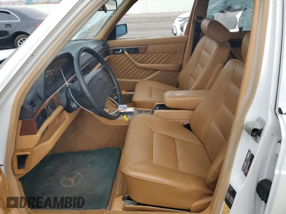1989 Mercedes-Benz 560 with VIN WDBCA39E2KA479060, listed as a Copart auction lot 81924154 with 172,377 mi miles and Salvage Title. Bid and sale history available at DreamBid. Image 7.