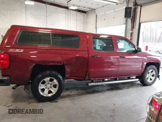 2014 Chevrolet Silverado 1500 LT with VIN 3GCUKREC9EG358476, listed as a IAAI auction lot 41866756 with 210,880 mi miles and . Bid and sale history available at DreamBid. Image 13.