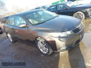 2012 Kia Forte EX with VIN KNAFU4A27C5476031, listed as a IAAI auction lot 41633058 with 137,998 mi miles. Bid and sale history available at carsss.com. Image 1.