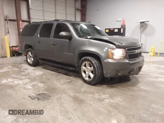 2011 Chevrolet Suburban LT with VIN 1GNSCJE0XBR180270, listed as a IAAI auction lot 41531193 with 202,493 mi miles. Bid and sale history available at carsss.com. Image 1.