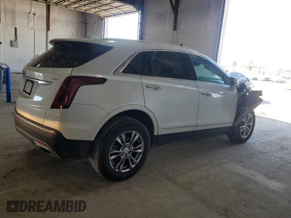 2020 Cadillac XT5 Premium Luxury FWD with VIN 1GYKNCRS9LZ235779, listed as a Copart auction lot 47775965 with 59,501 mi miles and Salvage Title. Bid and sale history available at carsss.com. Image 3.