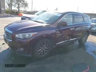 2013 Infiniti JX35 with VIN 5N1AL0MM0DC324641, listed as a IAAI auction lot 41309512 with 133,247 mi miles. Bid and sale history available at carsss.com. Image 2.
