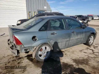 2003 Ford Focus ZTS with VIN 1FAFP38393W115936, listed as a Copart auction lot 42598715 with 100,610 mi miles and Salvage Title. Bid and sale history available at carsss.com. Image 3.