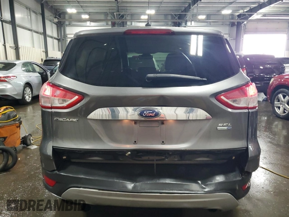 2013 Ford Escape SEL с VIN 1FMCU9H95DUA25494, выставлен на аукционе Copart как лот 57235905 с пробегом 158 743 миль миль и Списание • Salvage title. История ставок и продаж доступна на DreamBid. Изображение 6.