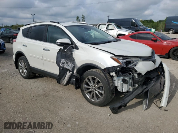 2016 Toyota RAV4 Limited with VIN 2T3DFREVXGW495077, listed as a Copart auction lot 55533505 with 122,483 mi miles and Salvage title. Bid and sale history available at DreamBid. Image 4.