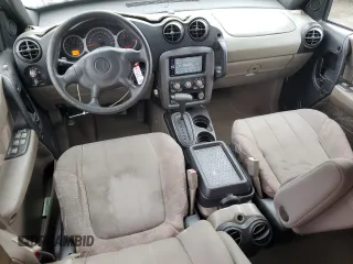 2003 Pontiac Aztek z VIN 3G7DA03E53S540008, wystawiony jako Copart lot #79408724 z przebiegiem 268 928 mil mil oraz Szkody całkowita. Historia ofert i sprzedaży dostępna na DreamBid. Obrazek 8.
