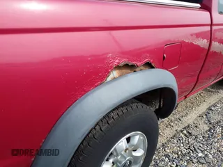 1998 Nissan Frontier with VIN 1N6DD26Y7WC378867, listed as a IAAI auction lot 42187874 with Not provided miles and . Bid and sale history available at DreamBid. Image 13.
