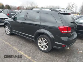 2013 Dodge Journey Crew с VIN 3C4PDCCG1DT640935, выставлен на аукционе IAAI как лот 40676564 с пробегом 154 885 миль миль и . История ставок и продаж доступна на DreamBid. Изображение 3.