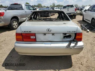 2000 Lexus LS 400 z VIN JT8BH28F2Y0180758, wystawiony jako Copart lot #67166494 z przebiegiem Nie podano mil oraz Nie do naprawy. Historia ofert i sprzedaży dostępna na DreamBid. Obrazek 6.