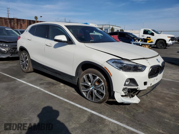 2020 BMW X2 xDrive28i with VIN WBXYJ1C02L5P85780, listed as a Copart auction lot 43665555 with 14,451 mi miles and Salvage Title. Bid and sale history available at carsss.com. Image 4.
