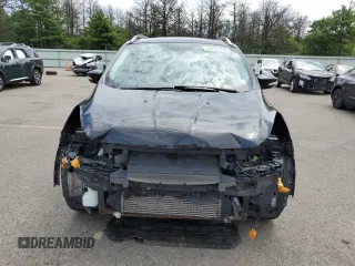2016 Ford Escape Titanium с VIN 1FMCU9J93GUB78356, выставлен на аукционе Copart как лот 64264715 с пробегом 95 775 миль миль и Списание • Salvage title. История ставок и продаж доступна на DreamBid. Изображение 5.