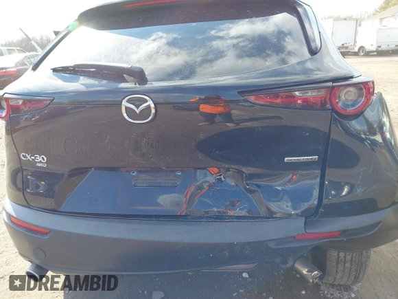 2022 Mazda CX-30 S with VIN 3MVDMBALXNM402265, listed as a IAAI auction lot 41458605 with 76,291 mi miles and . Bid and sale history available at carsss.com. Image 18.