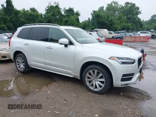 2016 Volvo XC90 T6 Momentum z VIN YV4A22PK2G1077973, wystawiony jako IAAI lot #42542618 z przebiegiem 215 032 mil mil oraz . Historia ofert i sprzedaży dostępna na DreamBid. Obrazek 1.