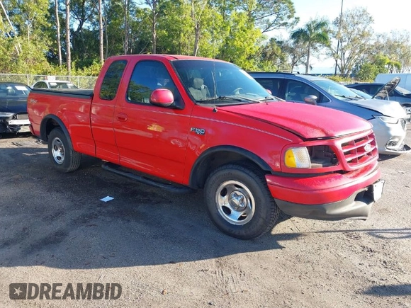 2002 Ford F-150 XL with VIN 1FTRX17232NB82055, listed as a IAAI auction lot 41146311 with 1 mi miles. Bid and sale history available at carsss.com. Image 1.