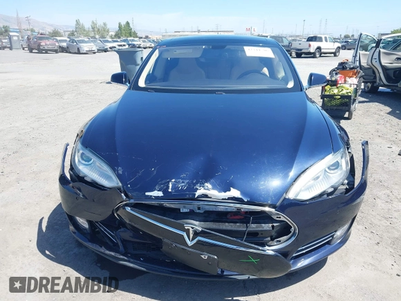2014 Tesla Model S 60 with VIN 5YJSA1H12EFP46760, listed as a IAAI auction lot 42344596 with 106,252 mi miles and . Bid and sale history available at DreamBid. Image 12.