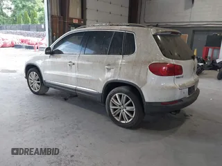 2012 Volkswagen Tiguan SE with VIN WVGAV7AXXCW533237, listed as a IAAI auction lot 42670923 with 227,323 mi miles and . Bid and sale history available at DreamBid. Image 3.