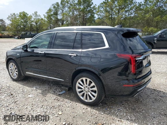 2020 Cadillac XT6 FWD Premium Luxury with VIN 1GYKPCRSXLZ104502, listed as a Copart auction lot 47808125 with 97,053 mi miles and Salvage Title. Bid and sale history available at carsss.com. Image 2.
