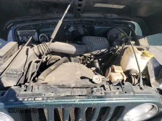2001 Jeep Wrangler SE with VIN 1J4FA29P71P329199, listed as a Copart auction lot 48144035 with 114,904 mi miles and Salvage Title. Bid and sale history available at carsss.com. Image 12.