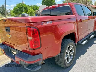 2015 Chevrolet Colorado 2WD Z71 with VIN 1GCGSCE31F1222448, listed as a Copart auction lot 65782675 with 120,009 mi miles and Clean title. Bid and sale history available at DreamBid. Image 4.