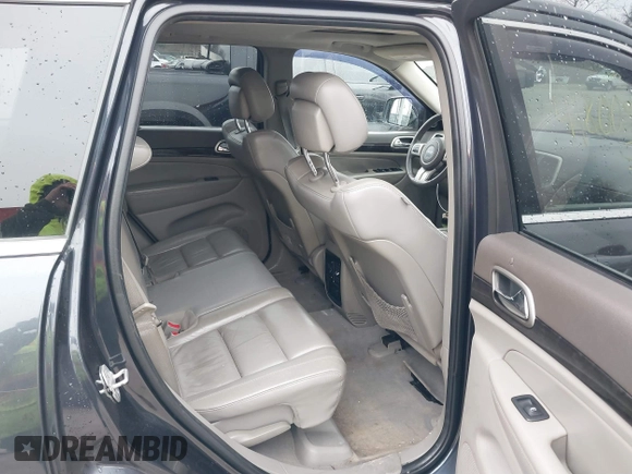 2013 Jeep Grand Cherokee Laredo with VIN 1C4RJFAG9DC506238, listed as a IAAI auction lot 41800981 with 172,676 mi miles. Bid and sale history available at carsss.com. Image 8.