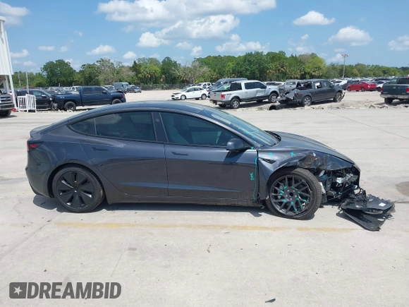 2024 Tesla Model 3 z VIN 5YJ3E1EAXRF864719, wystawiony jako IAAI lot #42129944 z przebiegiem 3 776 mil mil oraz . Historia ofert i sprzedaży dostępna na DreamBid. Obrazek 13.