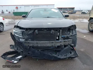 2016 Dodge Charger SXT with VIN 2C3CDXJG9GH303942, listed as a IAAI auction lot 41618893 with 116,630 mi miles. Bid and sale history available at carsss.com. Image 6.