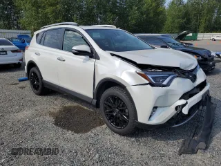 2016 Toyota RAV4 Limited with VIN JTMDFREV9GJ066429, listed as a Copart auction lot 61874995 with 77,686 mi miles and Salvage title. Bid and sale history available at DreamBid. Image 4.