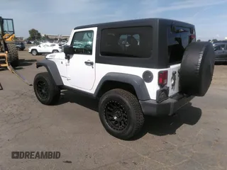 2016 Jeep Wrangler Sport with VIN 1C4AJWAG2GL280156, listed as a IAAI auction lot 42202881 with 55,942 mi miles and . Bid and sale history available at carsss.com. Image 3.