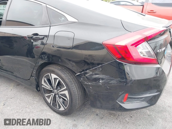 2016 Honda Civic Sedan EX-T with VIN 2HGFC1F34GH645220, listed as a IAAI auction lot 42043630 with 55,301 mi miles. Bid and sale history available at carsss.com. Image 6.