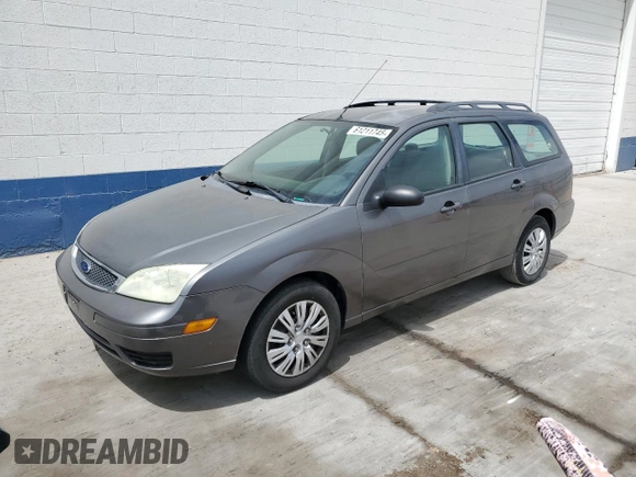 2006 Ford Focus SE with VIN 1FAHP36N56W223049, listed as a Copart auction lot 61211745 with 185,609 mi miles and Salvage title. Bid and sale history available at DreamBid. Image 1.