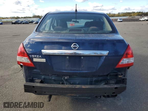 2009 Nissan Versa 1.8 S with VIN 3N1BC11E69L441683, listed as a Copart auction lot 43377925 with 111,958 mi miles and Salvage Title. Bid and sale history available at carsss.com. Image 6.
