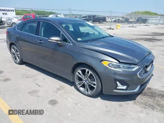2020 Ford Fusion Titanium with VIN 3FA6P0D9XLR131042, listed as a IAAI auction lot 42560444 with 95,351 mi miles and . Bid and sale history available at DreamBid. Image 1.