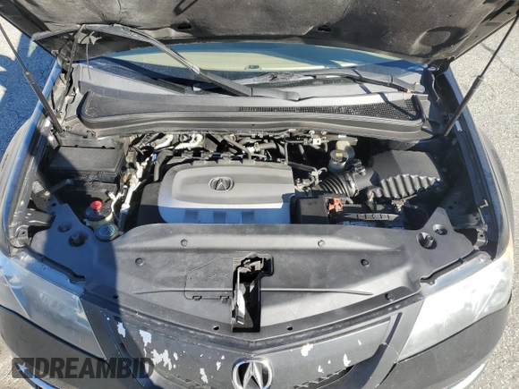 2012 Acura MDX z VIN 2HNYD2H24CH527719, wystawiony jako Copart lot #47137735 z przebiegiem 152 969 mil mil oraz Szkoda całkowita • Salvage title. Historia ofert i sprzedaży dostępna na DreamBid. Obrazek 14.