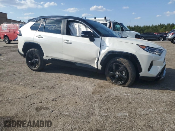 2021 Toyota RAV4 Hybrid XSE with VIN 2T3E6RFV1MW028094, listed as a Copart auction lot 52596615 with 68,497 mi miles and Salvage title. Bid and sale history available at DreamBid. Image 4.