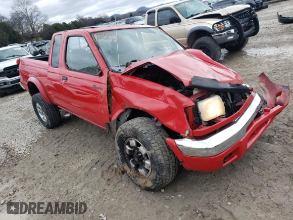 1999 Nissan Frontier XE with VIN 1N6ED26Y4XC313142, listed as a Copart auction lot 85777354 with 122,822 mi miles and Salvage title. Bid and sale history available at DreamBid. Image 4.