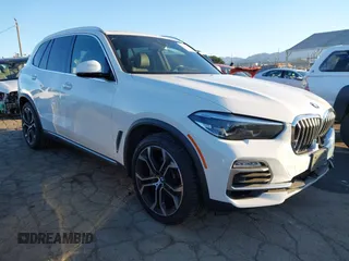 2021 BMW X5 sDrive40i with VIN 5UXCR4C03M9G59554, listed as a IAAI auction lot 41358056 with 47,577 mi miles. Bid and sale history available at carsss.com. Image 1.