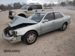 1994 Toyota Camry XLE with VIN JT2GK13E0R0039215, listed as a Copart auction lot 79532404 with 109,104 mi miles and Salvage Title. Bid and sale history available at carsss.com. Image 1.