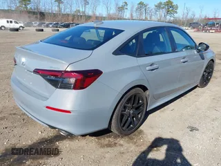 2025 Honda Civic Sport with VIN 2HGFE2F5XSH521799, listed as a IAAI auction lot 41831110 with 5,406 mi miles and . Bid and sale history available at DreamBid. Image 4.