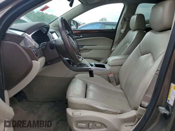2014 Cadillac SRX Luxury Collection z VIN 3GYFNBE3XES626319, wystawiony jako Copart lot #54776405 z przebiegiem 107 734 mil mil oraz Szkoda całkowita • Salvage title. Historia ofert i sprzedaży dostępna na DreamBid. Obrazek 7.
