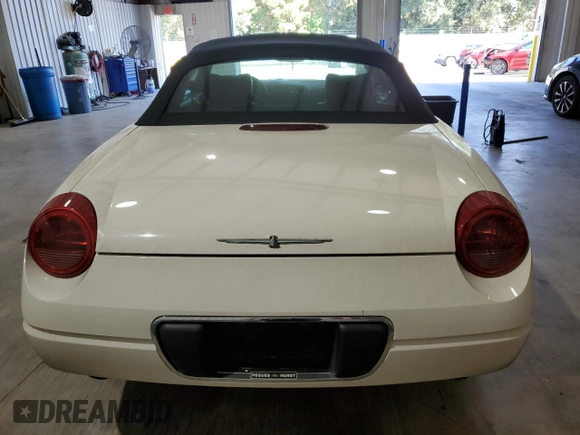 2002 Ford Thunderbird Hardtop Premium with VIN 1FAHP60A32Y125580, listed as a Copart auction lot 77493514 with 74,619 mi miles and Salvage Title. Bid and sale history available at DreamBid. Image 6.