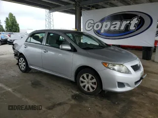 2010 Toyota Corolla with VIN 1NXBU4EE1AZ206765, listed as a Copart auction lot 60996215 with 196,623 mi miles and Salvage title. Bid and sale history available at DreamBid. Image 4.