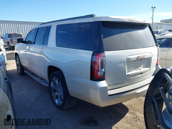 2015 GMC Yukon XL SLT with VIN 1GKS2HKC0FR179223, listed as a IAAI auction lot 40964120 with 184,592 mi miles. Bid and sale history available at carsss.com. Image 3.