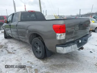 2010 Toyota Tundra 4WD Truck with VIN 5TFCY5F13AX009786, listed as a IAAI auction lot 41354641 with 204,918 mi miles. Bid and sale history available at carsss.com. Image 3.