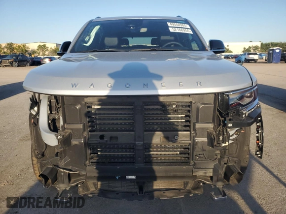 2023 Jeep Wagoneer Series II Carbide с VIN 1C4SJVBP7PS553076, выставлен на аукционе Copart как лот 52166955 с пробегом 11 585 миль миль и Списание • Salvage title. История ставок и продаж доступна на DreamBid. Изображение 5.