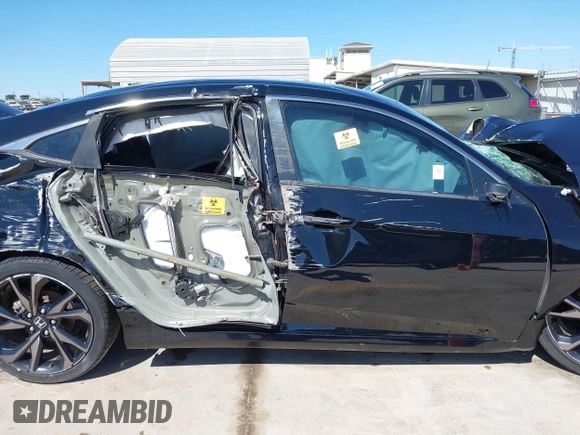 2019 Honda Civic Sport with VIN 19XFC2F89KE051016, listed as a IAAI auction lot 42042322 with 36,775 mi miles and . Bid and sale history available at DreamBid. Image 12.